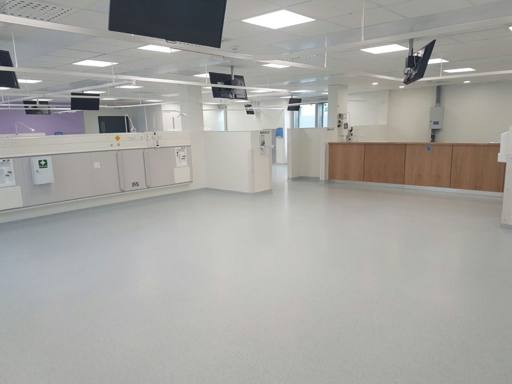Laboratory or medical prep room with epoxy decorative flake flooring