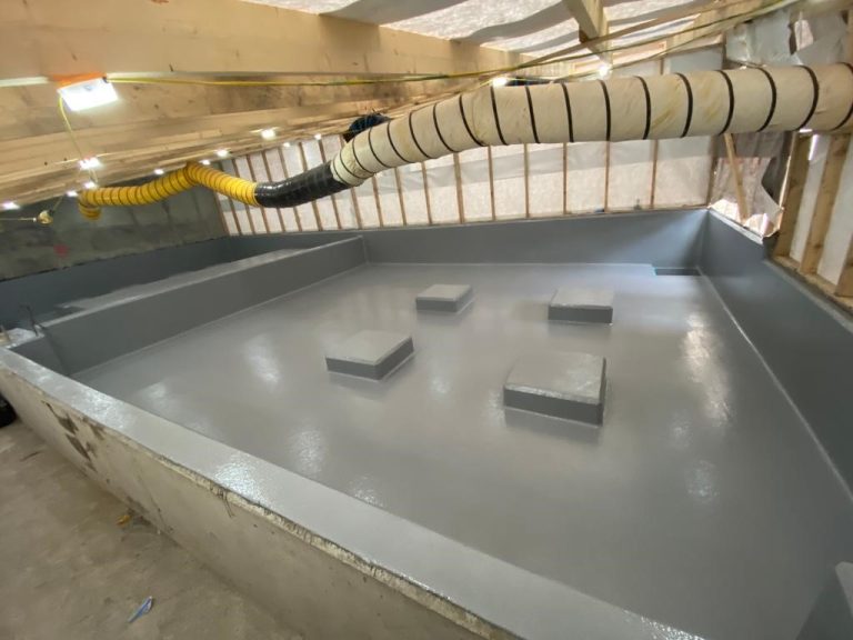 Smooth, chemical-resistant floor in technology manufacturing facility
