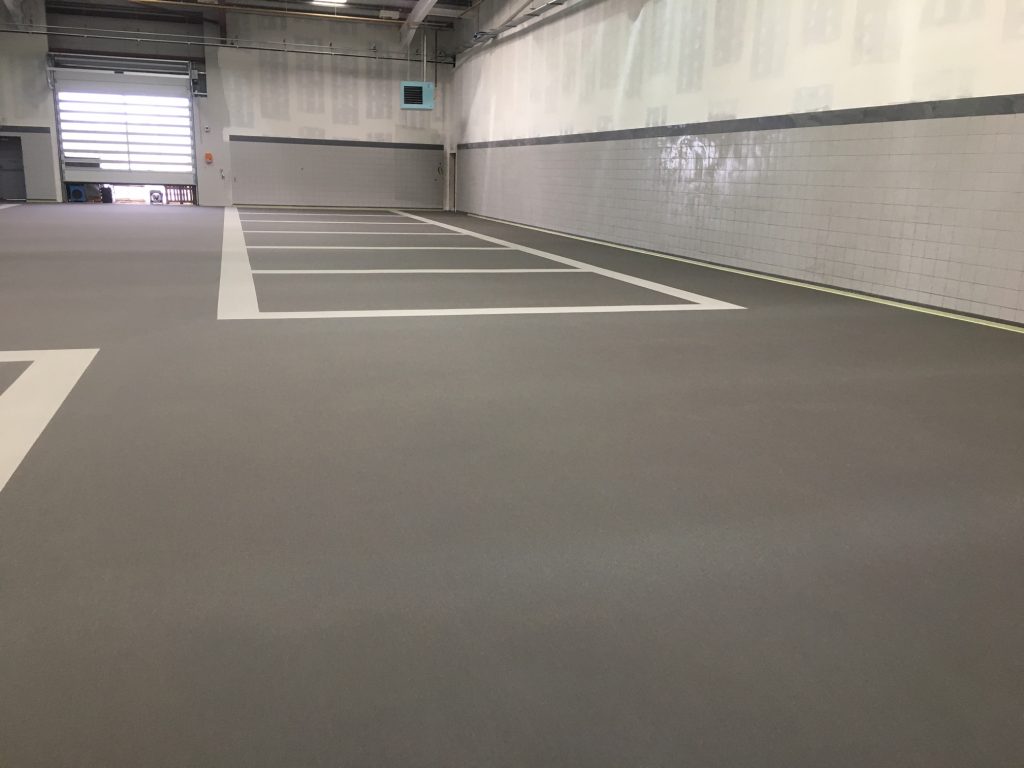 Workshop floor with epoxy system and floor markings