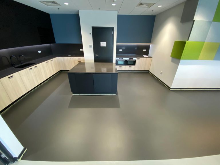 Multi-coloured epoxy flooring in support areas of data centre